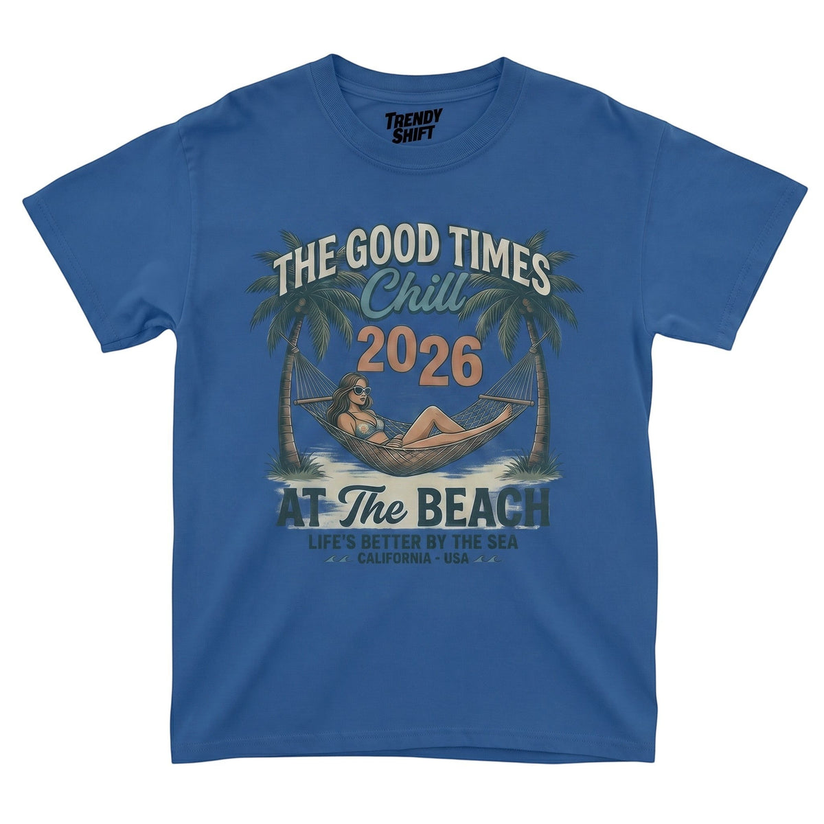 TrendyShift.Com blue graphic t-shirt featuring a retro beach scene with a woman in a hammock and palm trees.