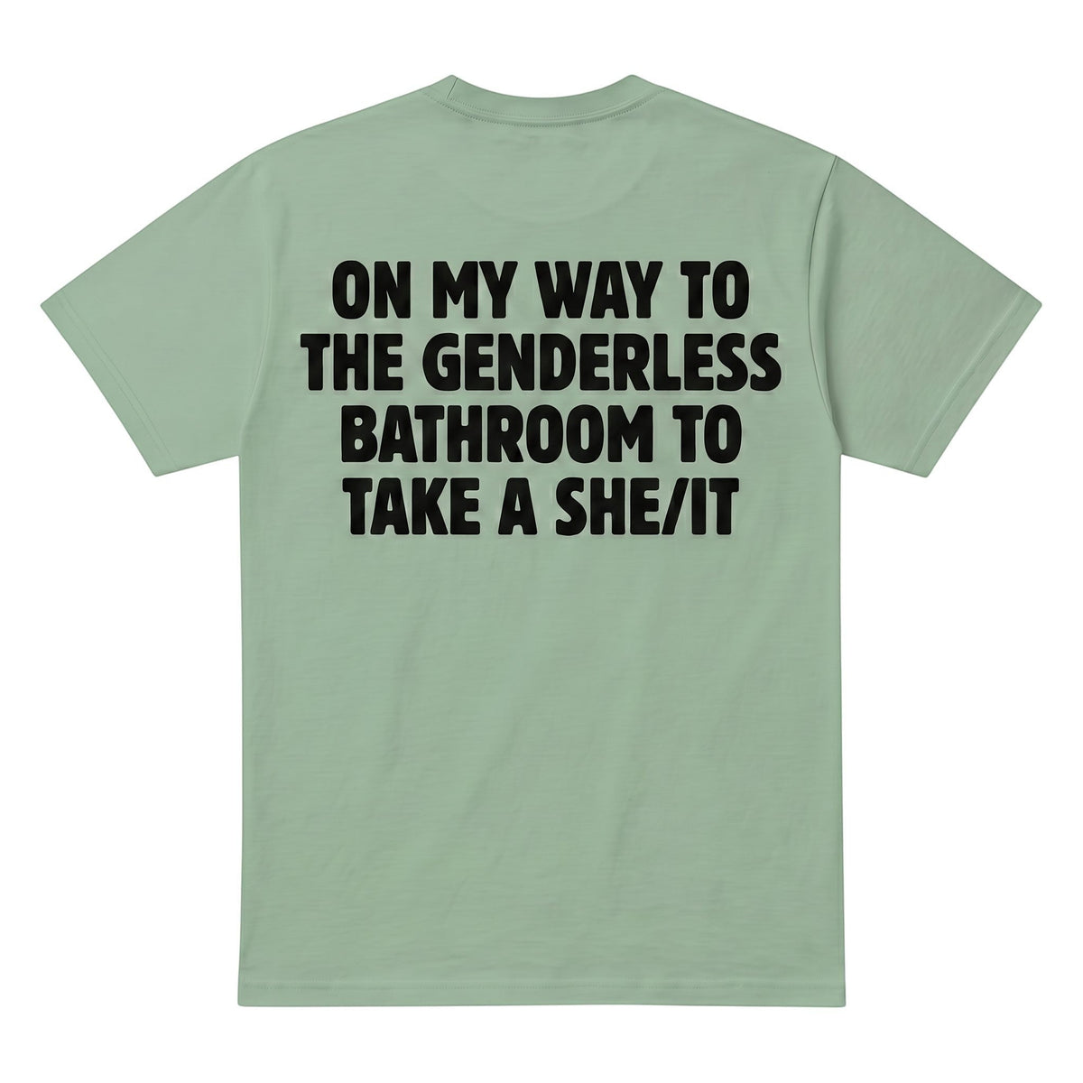 TrendyShift.Com sage green cotton t-shirt with bold black text on the back featuring humorous bathroom wordplay.