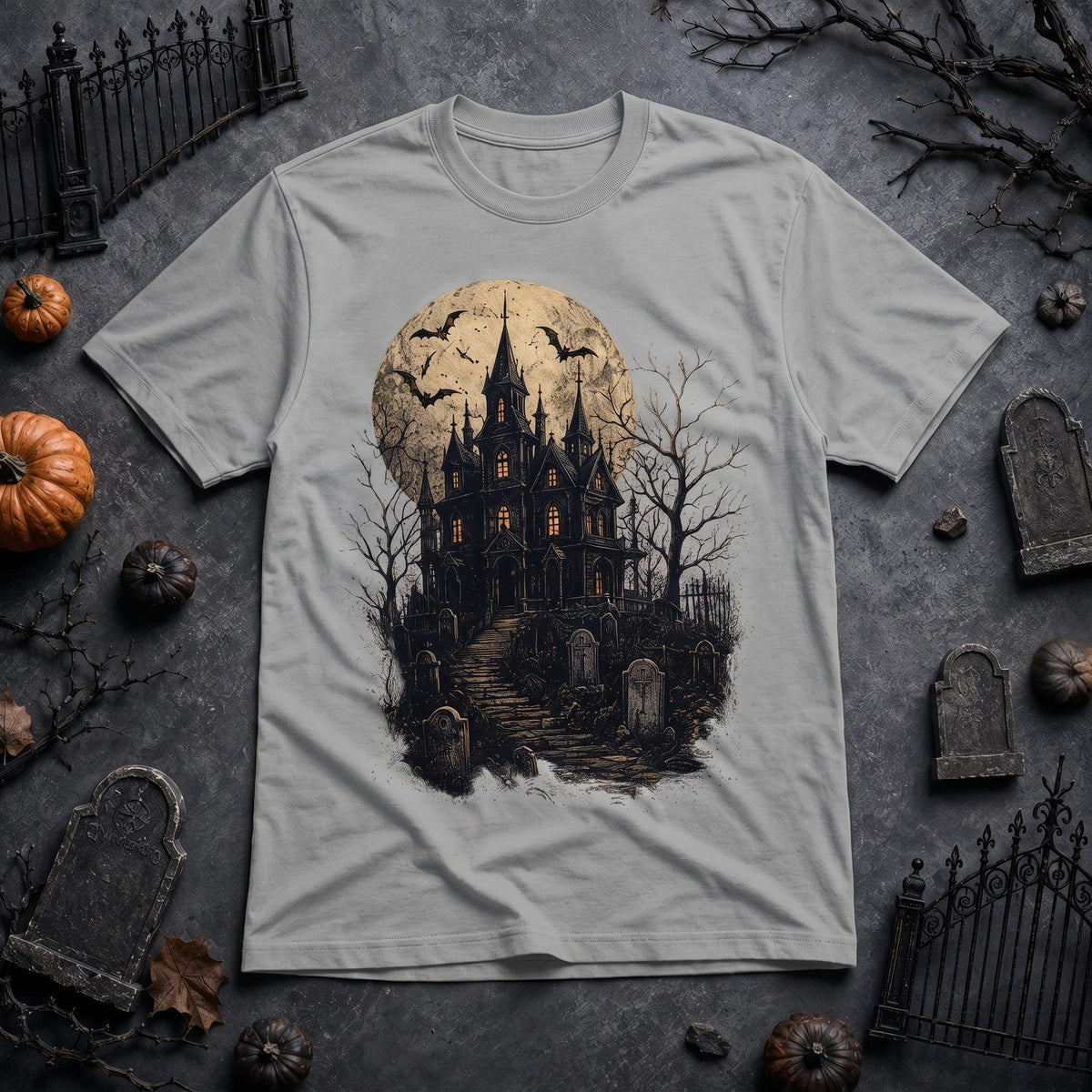 WearTheJoke.com grey crew neck t-shirt featuring a spooky haunted house, full moon, and bats graphic print.